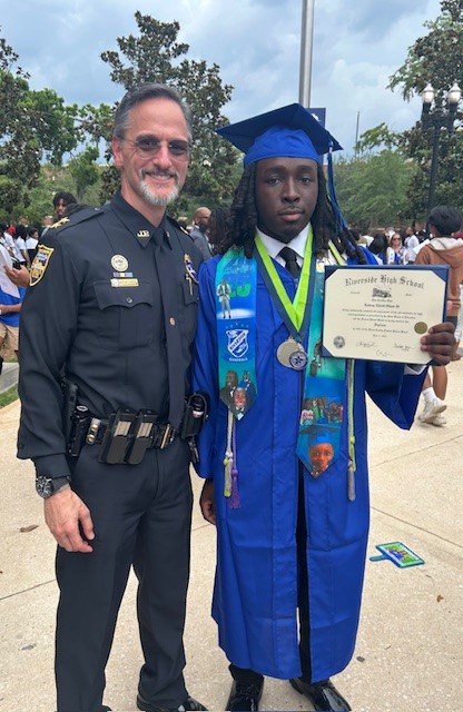 Mentor and youth with law enforcement
